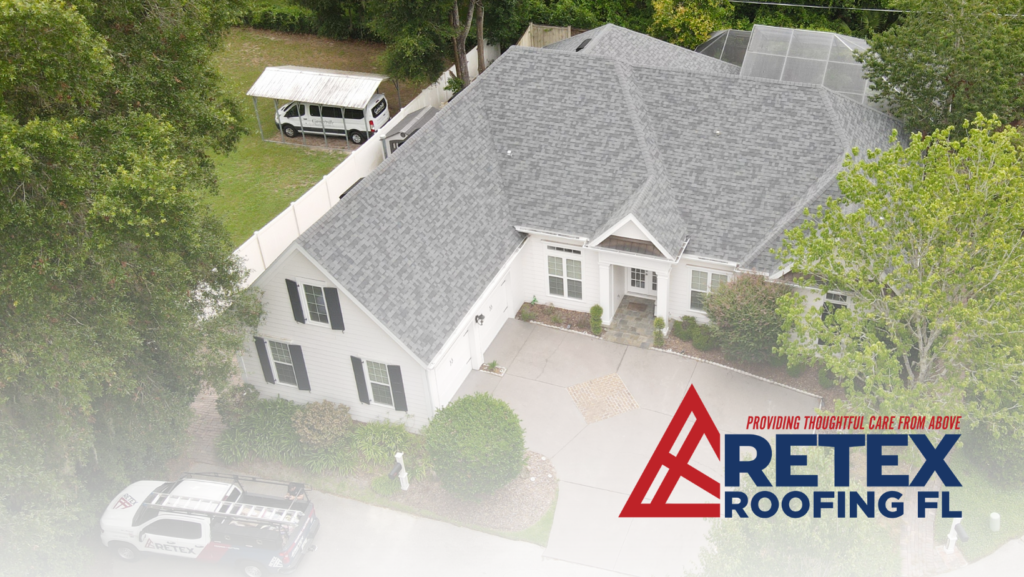 A newly finished architectural shingle roof in sunlight