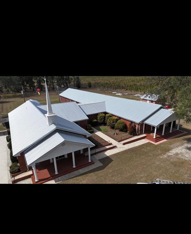 A commercial metal roof installed by Retex Roofing