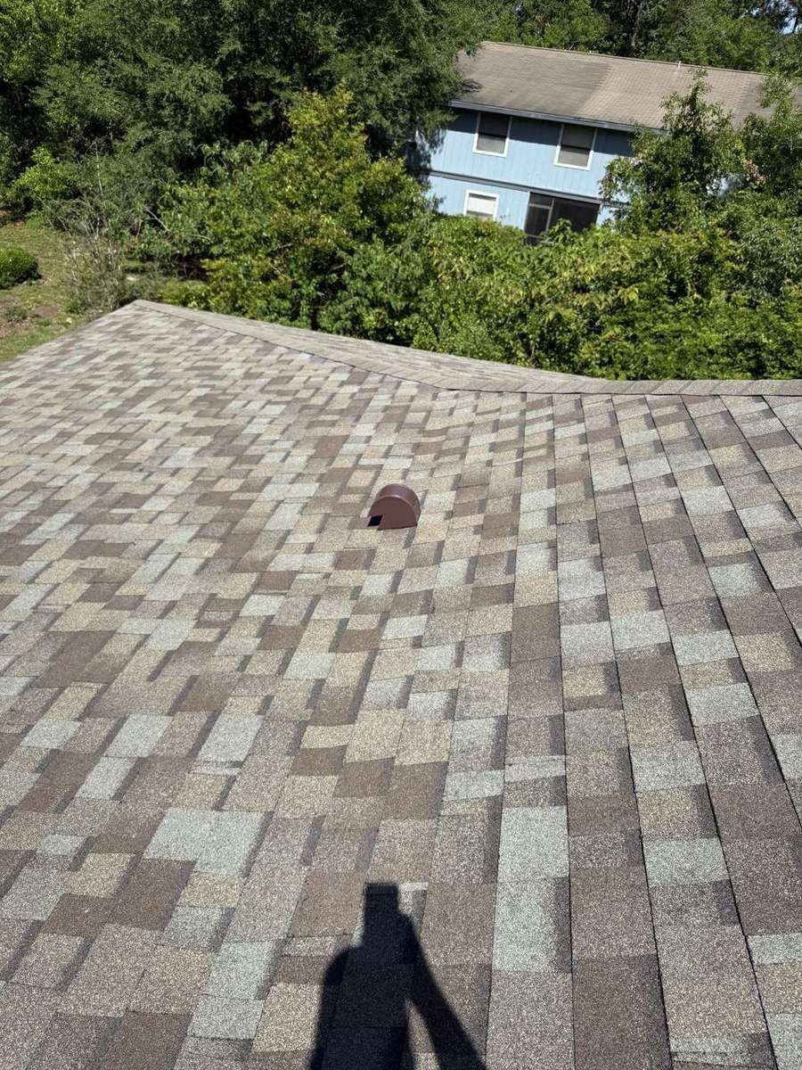 A completed architectural shingle roof in North Central Florida